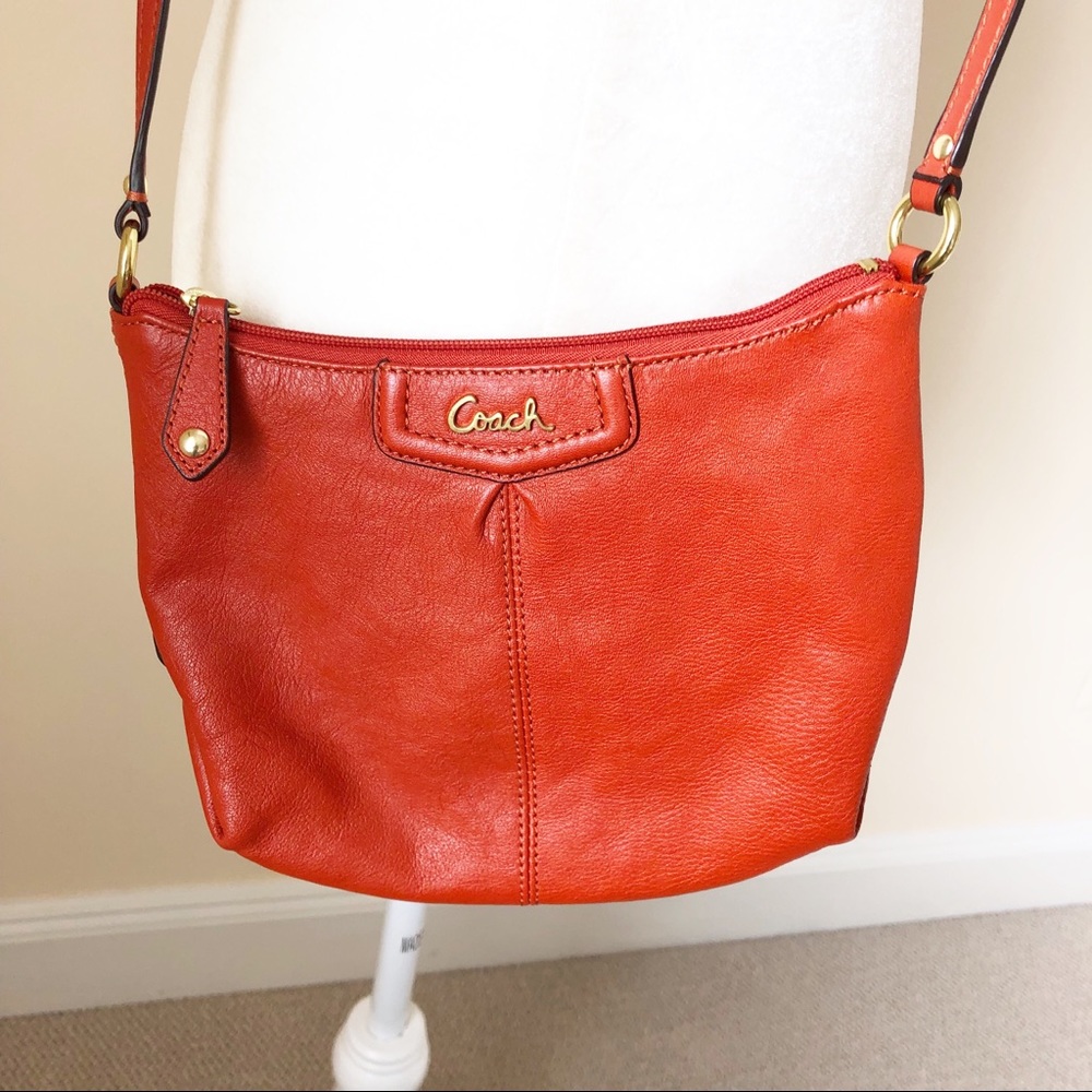 Coach factory small deep orange crossbody bag.